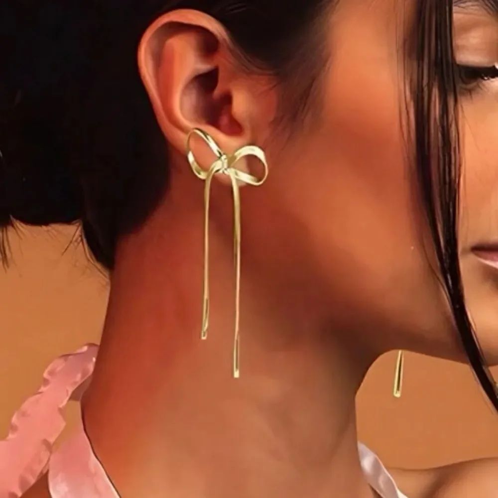 gold bow tassel drop earrings H116